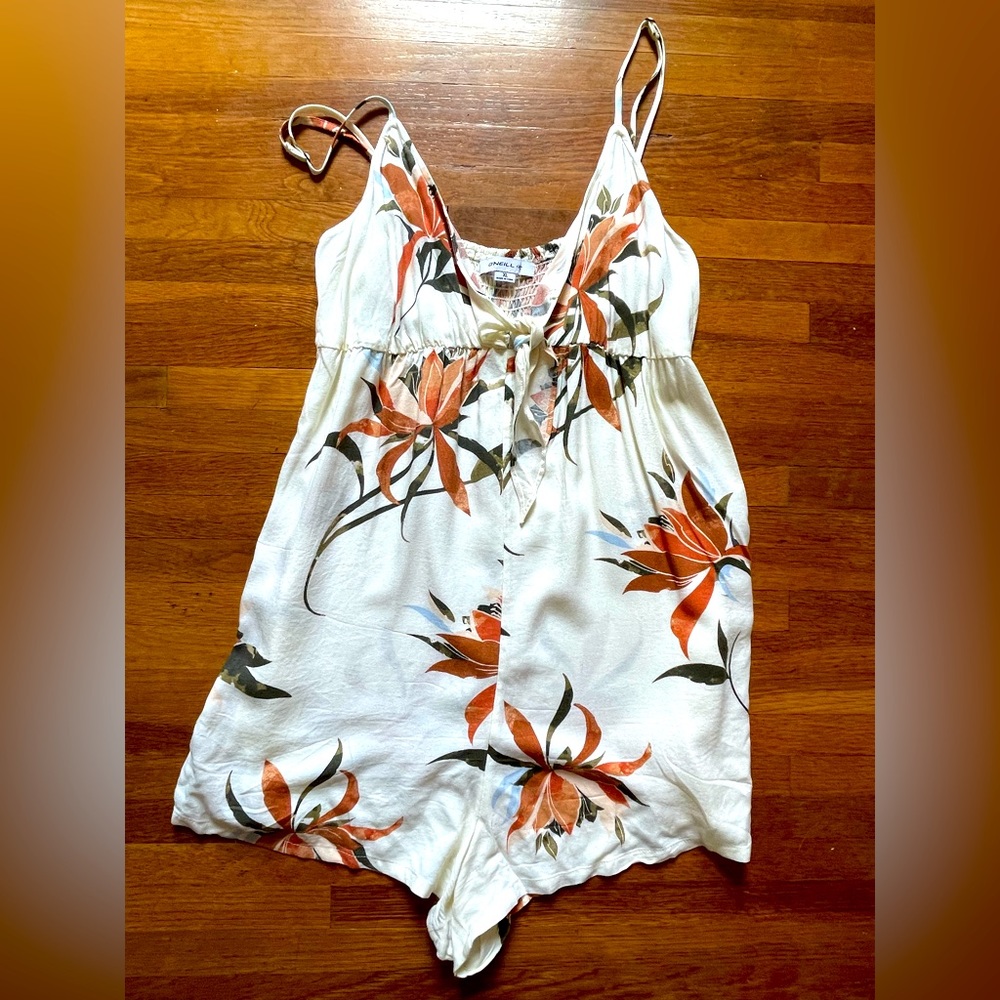 Brand New without Tags. Size X-Large. O’Neill Vanilla Floral Romper.